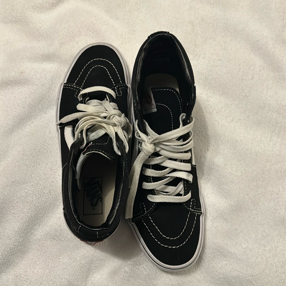 Black and white vans 
Only worn once 
Look brand new 
VANS